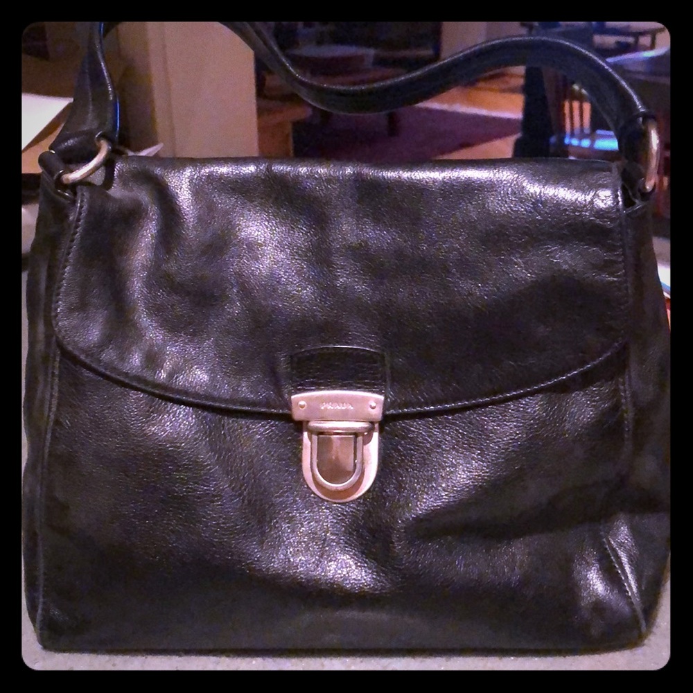 Black PRADA leather bag.